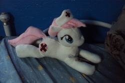 Size: 4000x2672 | Tagged: safe, artist:azedo, nurse redheart (mlp), earth pony, equine, fictional species, mammal, pony, feral, friendship is magic, hasbro, my little pony, 2013, clothes, female, hat, high res, irl, lying down, mare, nurse hat, photo, photographed artwork, plushie, prone, solo, solo female, tail