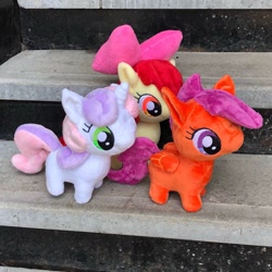 Size: 1440x1440 | Tagged: safe, artist:hibiscus_stitch, apple bloom (mlp), scootaloo (mlp), sweetie belle (mlp), earth pony, equine, fictional species, mammal, pegasus, pony, unicorn, feral, friendship is magic, hasbro, my little pony, 2019, bow, cutie mark crusaders (mlp), feathered wings, feathers, female, filly, foal, folded wings, hair bow, horn, irl, photo, photographed artwork, plushie, tail, trio, trio female, wings, young