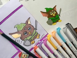Size: 566x427 | Tagged: safe, artist:dokidokistudios, link (zelda), fictional species, furby, anthro, hasbro, nintendo, the legend of zelda, 2020, clothes, hat, low res, male, pencil, shield, solo, solo male, species swap, sword, text, traditional art