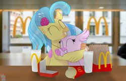 Size: 2650x1702 | Tagged: safe, artist:rainbow eevee, princess skystar (mlp), silverstream (mlp), bird, equine, fictional species, hippogriff, mammal, feral, friendship is magic, hasbro, mcdonald's, my little pony, my little pony: the movie, blue hair, blue mane, cousins, cup, cute, drink, duo, duo female, eyes closed, fast food, female, females only, food, fur, hair, happy, hug, irl, mane, omnivore, paper bag, paws, photo, pink body, pink fur, restaurant, smiling, switzerland, table, watermark, wings, yellow body, yellow fur, zürich