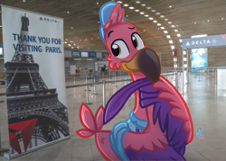 Size: 1521x1090 | Tagged: safe, artist:rainbow eevee, freddy (t.o.t.s.), bird, flamingo, disney, t.o.t.s., airport, charles de gaulle airport, cheek fluff, clothes, delta, eyebrows, feathers, fluff, france, grin, hat, irl, male, paris, photo, sign, smiling, solo, solo male, thinking