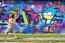 Size: 900x600 | Tagged: safe, photographer:alexandre pereira, sonic the hedgehog (sonic), hedgehog, human, mammal, anthro, humanoid, cc by-sa, creative commons, sega, sonic the hedgehog (series), 2011, duo, duo male, graffiti, holding, holding object, irl, irl human, male, males only, photo, photographed artwork, spray can, street art
